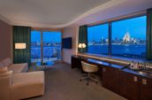 Living Room Suite overlooking river and New York Skyline at night