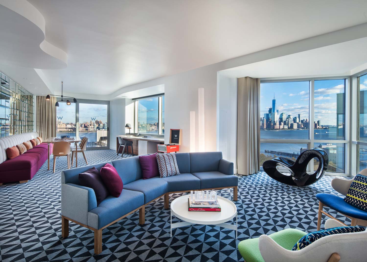 hotel suite overlooking river and New York City skyline